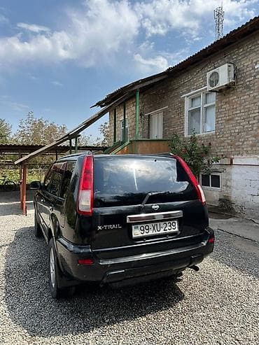 авто фольксваген: Nissan X-Trail: 2 л | 2003 г. Кроссовер — 3