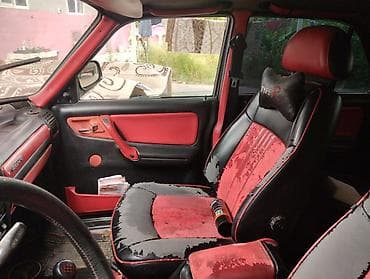 opel tigra 2005: GAZ Volga 3110, qara rəng, sedan kuzov. Xüsusiyyətlər: - Klassik xrom — 7