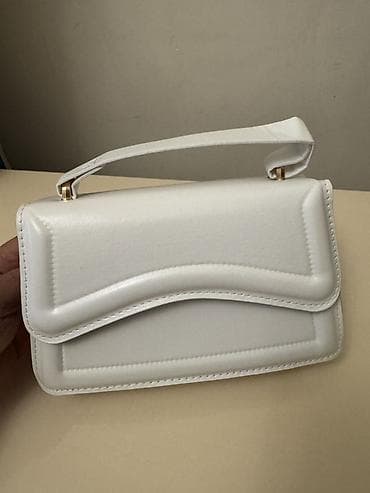 cuxol: Ağ mini çiyin/əl çantası

Yenidir istidade olunmayib — 1