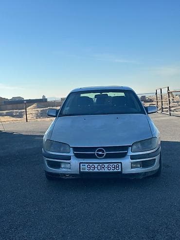 kia optima 2012: Opel Omega: 2 l | 1999 il Sedan — 1