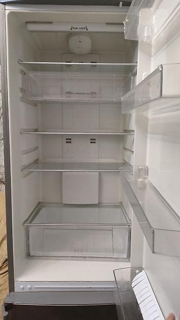 Kompüter, noutbuk və planşetlər: Xarab 2 qapılı Hotpoint Ariston Soyuducu Satılır, rəng - Gümüşü — 2