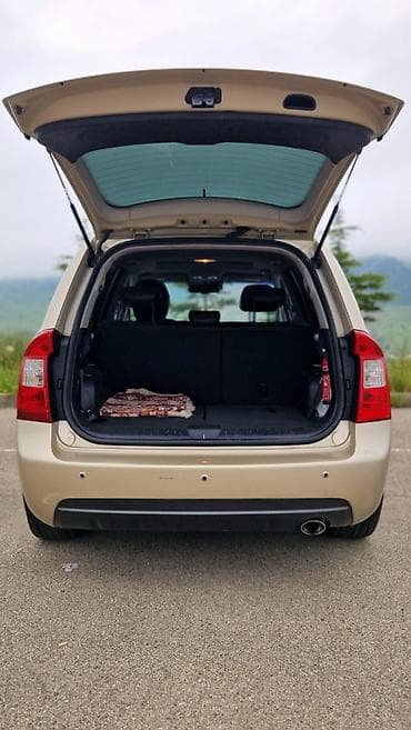 islenmis kompressor: Kia Carens: 2 l | 2007 il Van/Minivan — 4