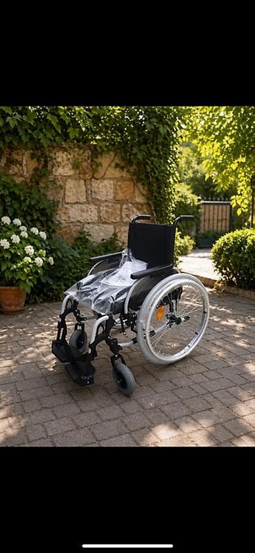 Məhsul: Manual əlil arabası Təsvir: - Yüngül və dayanıqlı metal şassi