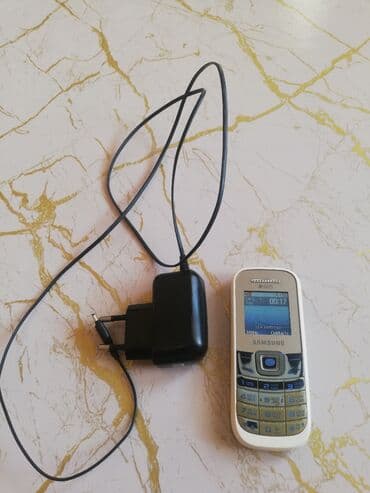 55ru7200 samsung: Samsung i8000 Omnia II — 1