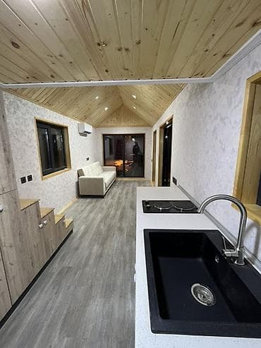 kontener ev: Modul tipli mobil ev – “tiny house” Xüsusiyyətlər: - Daşınan — 4