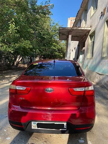 bmw e 39: Kia Rio sedan – qırmızı rəng - Kuzov: 4 qapılı sedan, parlaq qırmızı — 2