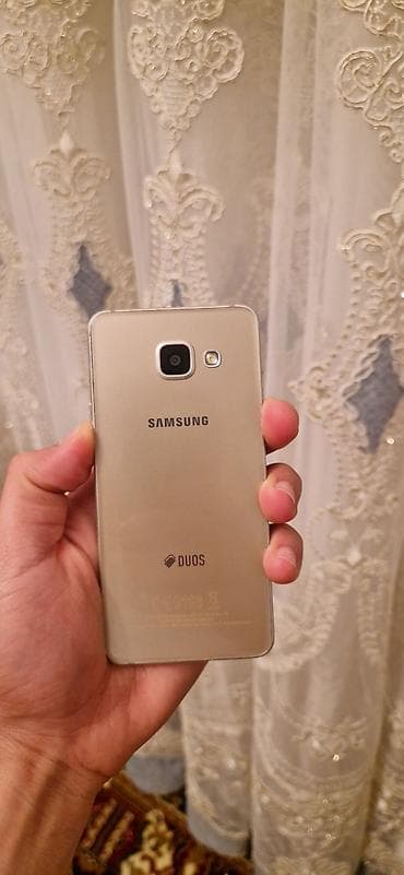 soyuducu kamera satilir: Samsung Galaxy A3, 16 GB, rəng - Qızılı, İki sim kartlı — 1