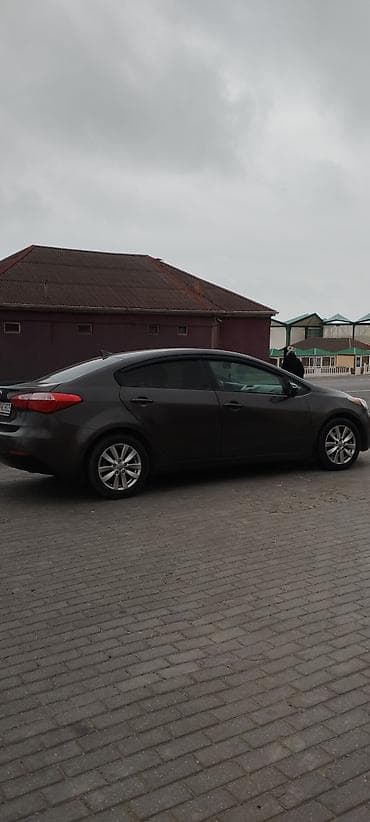 авто руль: Kia Forte: 1.8 л | 2013 г. Седан — 2