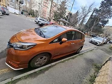 prada naocare: Nissan Note e-POWER, narıncı rəngli, şəhər üçün ideal hibrid (benzin — 4