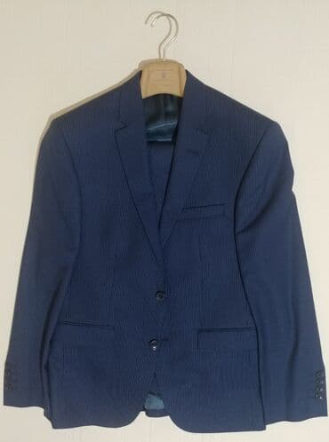 Kostyum 48 ölçü Tünd göy rəngdə Cəmi 2 dəfə geyinilib,yəni yenidən — 1