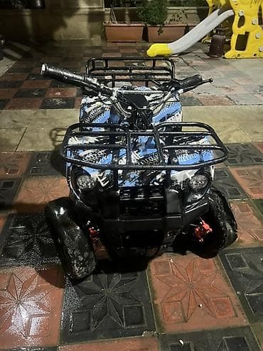 Uşaq kvadı – 4 təkərli mini ATV Xüsusiyyətlər: - Elektrikle işləyən — 1