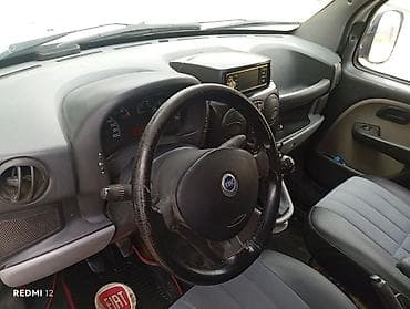 2 ci el konteyner: Fiat Doblo: 1.3 l | 2008 il Van body type — 7