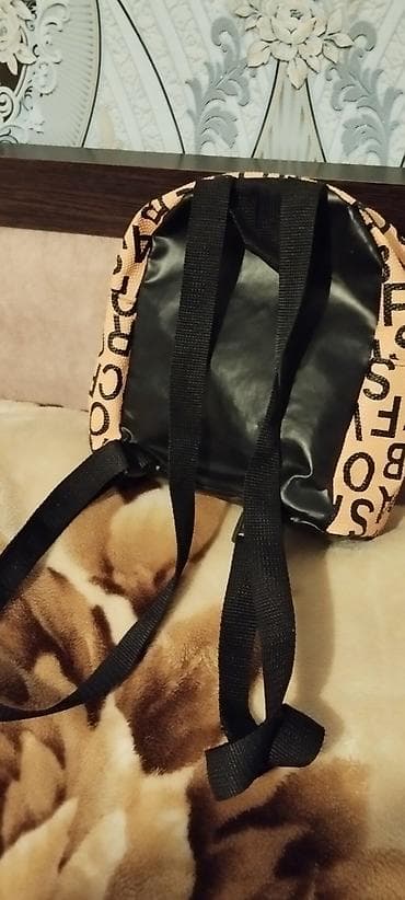 mekteb cantasi: Orta boy bel çantasi sari rengde qara detaylidi çoox az istifade — 3