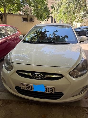 klas 6: Hyundai Accent: 1.6 l | 2012 il Sedan — 1