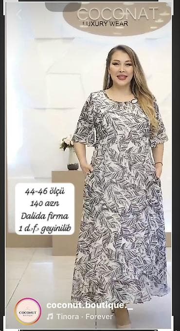 elbiseler: - Darkwin firma: qara, düyməli, kofta/kimono tipli uzun tunik. Yuxarı — 2