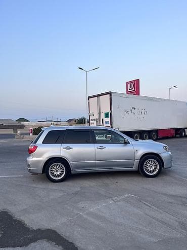 sam diskiler: Mitsubishi Airtrek (RHD) – şəhər və uzun yol üçün komfortlu krossover — 4