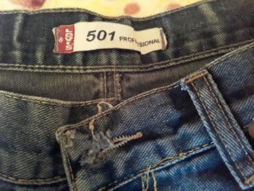 kişilər üçün trusu dəsti: 4 ədəd istifadə olunmuş kişi cins şalvarları satılır. Türkiyə — 12