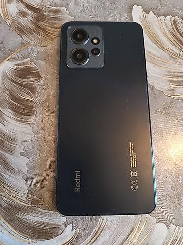 philips xenium 9@9h: Xiaomi Redmi smartfon - Arxa paneldə “Redmi” loqosu, kvadrat formalı — 2