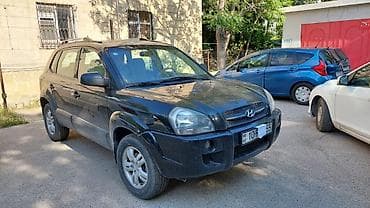 Hyundai Tucson, qara rəng, 5 qapılı SUV. İli 2006-nın sonu(2007 — 3