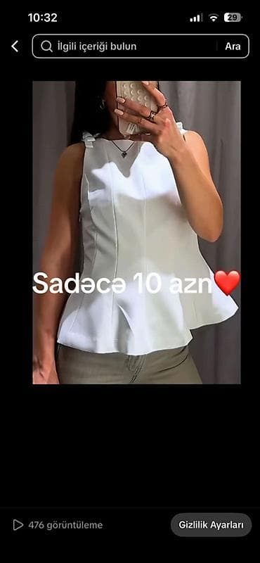 Zərif iki üst geyim dəsti 1) Ağ peplum bluz: - Qolsuz, çiyinlərdə — 1