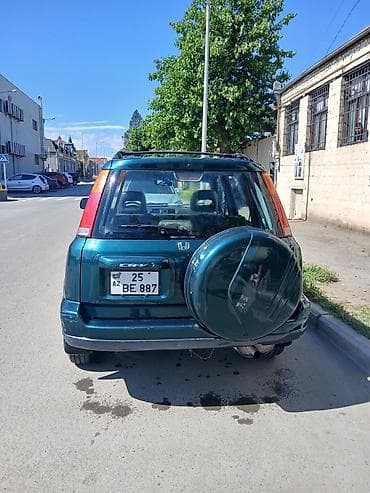 baqaj: Honda CR‑V (1-ci nəsil) – yaşıl rəngli, 5 qapılı, şəhər və yüngül — 10