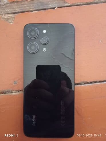 Redmi 12, 128 GB, rəng - Qara, Barmaq izi lalafo.az -da Redmi 12, 128 GB, rəng - Qara, Barmaq izi