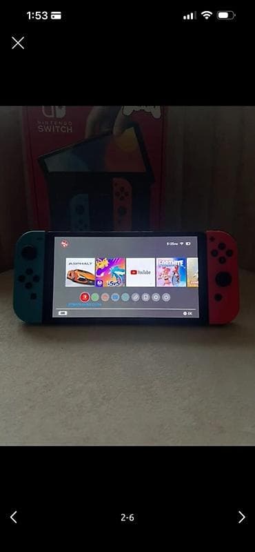 soba aliram: Nintendo Switch (Neon Blue/Neon Red Joy‑Con) – tam paket Ideal — 2