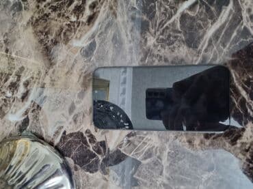 baş qırxan: IPhone 12 Pro, Pacific Blue, Face ID — 2