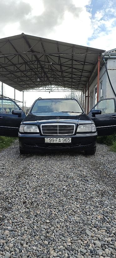 opel vectra a: Mercedes-Benz 220: 2.2 l | 1998 il Universal — 4