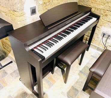 elektro piano: Koreya istehsali olan dünya şöhrətli Kurzweil pianoları. Sevimli — 1