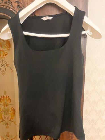 əsgər formaları: Brend: Penti. L olcu. yeni Model: Qolsuz topo - Rəng: qara - Ölçü: L — 1