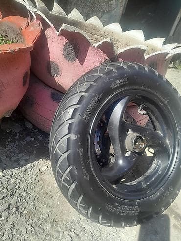 teker alisi: Skuter ön təkər komplekti - Ölçü: 3.50-10 - Marka: Kenda (Nylon) - — 3