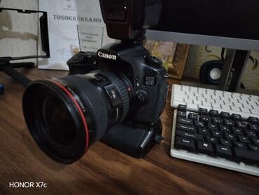 Canon 60 de body. Canon 17 40. mm linza. Baterye girib