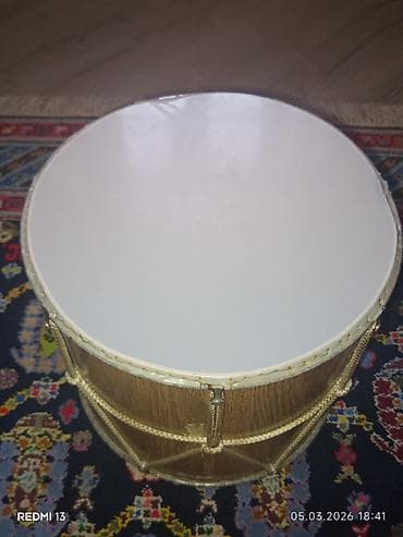 Nagara az işlənib səsi normaldı iki üzləridə ağ rəngidi birində