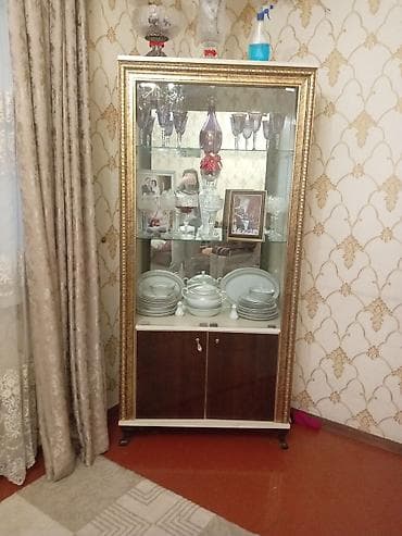 Şüşəli dolab vitrini, İşlənmiş, Ünvandan götürmə