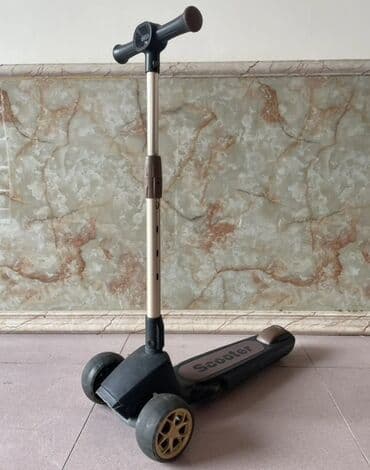 Uşaq skuteri – 3 təkərli model - Ön hissədə iki iri təkər, arxada bir lalafo.az -da Uşaq skuteri – 3 təkərli model - Ön hissədə iki iri təkər, arxada bir