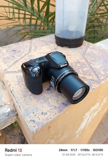 yemek bisiren aparat: Nikon brendinə məxsus qara rəngli fotoaparat, istifadəçilər üçün rahat — 3