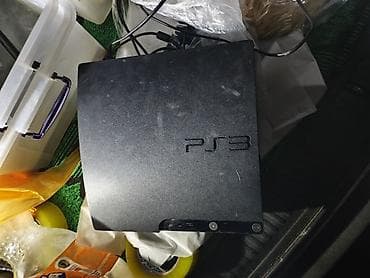 disk dvd: Sony PlayStation 3 (PS3) Slim oyun konsolu - Model: PS3 Slim (üst — 1