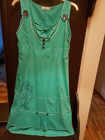 giyim: Sarafan. Türkiyə istehsalı. Ölçüsü - 44. Rəngi - firuzəyi. Qiyməti - — 4