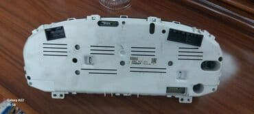 işlənmiş radiator: Kia Carens avtomobili üçün nəzərdə tutulmuş cihaz paneli. Bu panel — 2