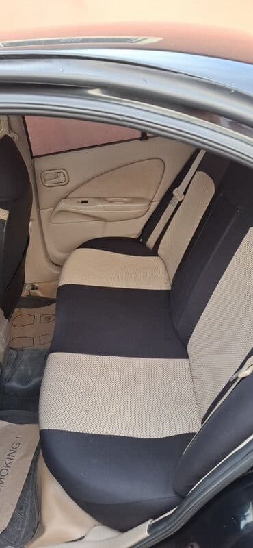 osram lampaları: Nissan Sunny sedan – geniş salonlu, komfortlu şəhər və uzun yol — 3