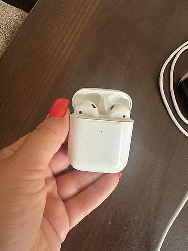 ses yaz: Apple AirPods (1-ci nəsil) simsiz qulaqlıq Xüsusiyyətlər: - Şarj — 1