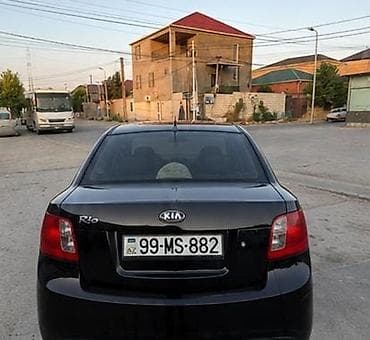 Nəqliyyat: Kia Rio: 1.4 l | 2011 il Sedan — 6