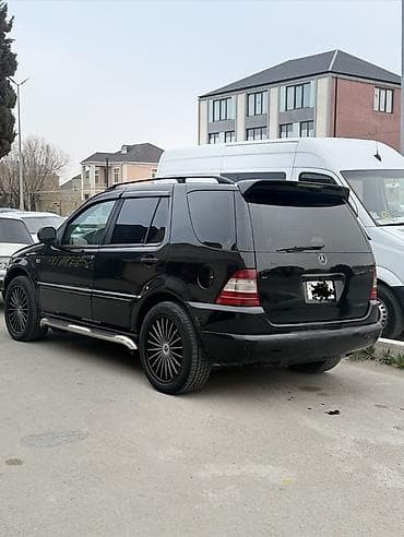 panarama ce kılas: Mercedes-Benz ML 320: 3.2 l | 2000 il Ofrouder/SUV — 6