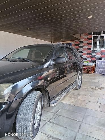 vito oturacaq: Kia Sorento, qara rəng, SUV kuzov. Güclü və rahat ailə maşını — 2