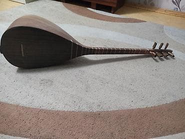 Saz – uzun saplı xalq çalğı aləti - Korpus: armud formalı, çoxzolaqlı