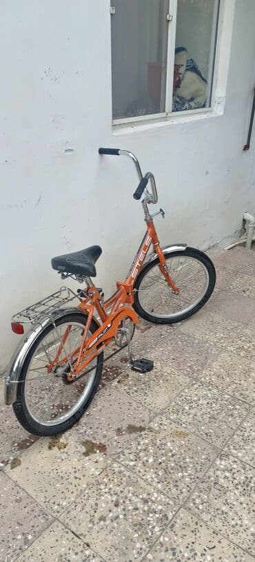 турники для дома купить: Stels markalı bu qatlanan velosiped narıncı rəngdədir və şəhər daxili — 1