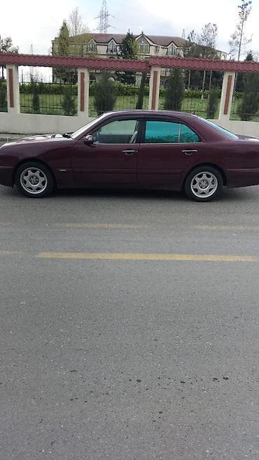 urban bufer qiymeti: Mercedes-Benz E-Class sedan (W210), tünd bordo rəng. - Kuzov: 4 qapılı — 3