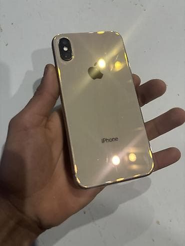 divarda televizor fiqurlari: IPhone Xs, 64 GB, Qızılı, Face ID — 1