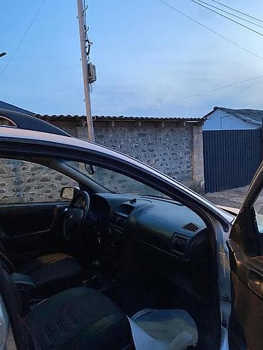 turbo az gazel: Opel Astra Caravan (universaI) – gümüşü rəng Xüsusiyyətlər: - Kuzov — 8